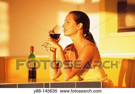 Woman drinking red wine View Large Photo Image Stock Photography - Woman drinking red wine. Fotosearch