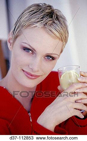 Stock Image - Woman drinking. Fotosearch