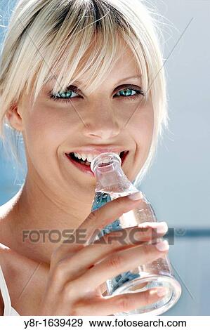 woman drinking View Large Photo Image Stock Photo - woman drinking. Fotosearch