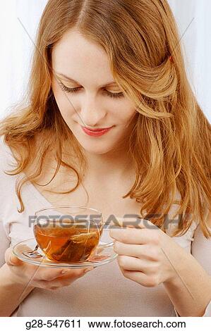 Woman drinking tea. View Large Photo Image Stock Image - Woman drinking tea.. Fotosearch