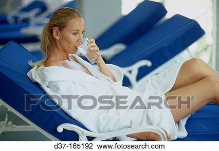 Woman drinking water View Large Photo Image Stock Image - Woman drinking water. Fotosearch