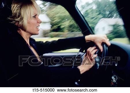 Woman driving and honking horn mad (road rage) View Large Photo Image Stock Image - Woman driving and honking horn mad (road rage). Fotosearch
