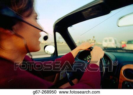 Woman driving. Los Angeles, California. USA View Large Photo Image Stock Image - Woman driving. Los Angeles, California. USA. Fotosearch