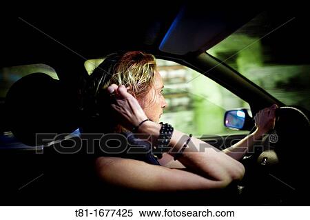 Stock Photography - woman driving. Fotosearch