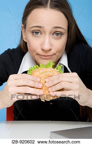 Woman Eating Sandwich View Large Photo Image Stock Image - Woman Eating Sandwich. Fotosearch