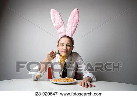 Stock Photo - Woman Eating Spaghetti. Fotosearch