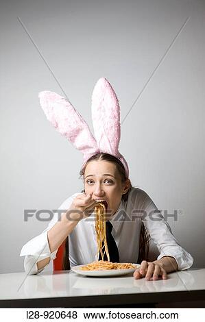 Stock Photo - Woman Eating Spaghetti. Fotosearch