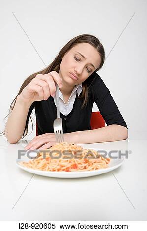 Woman Eating Spaghetti View Large Photo Image Stock Photography - Woman Eating Spaghetti. Fotosearch