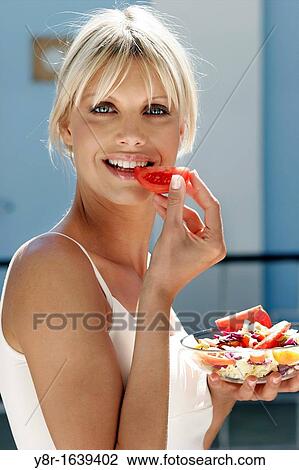 woman eating View Large Photo Image Stock Image - woman eating. Fotosearch