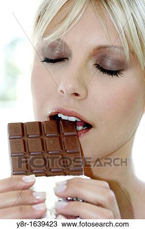 woman eating View Large Photo Image Stock Image - woman eating. Fotosearch