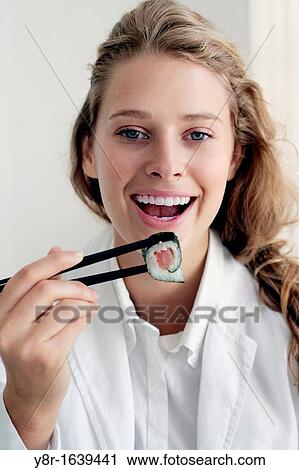 woman eating View Large Photo Image Stock Image - woman eating. Fotosearch