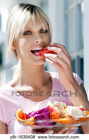 woman eating View Large Photo Image Stock Photo - woman eating. Fotosearch