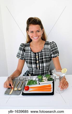 woman eating View Large Photo Image Stock Photography - woman eating. Fotosearch