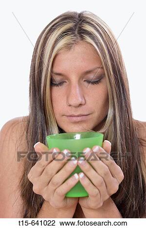 Woman enjoying a cup of tea, drink View Large Photo Image Stock Image - Woman enjoying a cup of tea, drink. Fotosearch