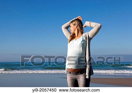 Woman Enjoying Her Pregnancy. View Large Photo Image Stock Image - Woman Enjoying Her Pregnancy.. Fotosearch