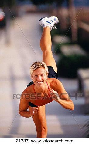 Woman exercising View Large Photo Image Stock Photo - Woman exercising. Fotosearch