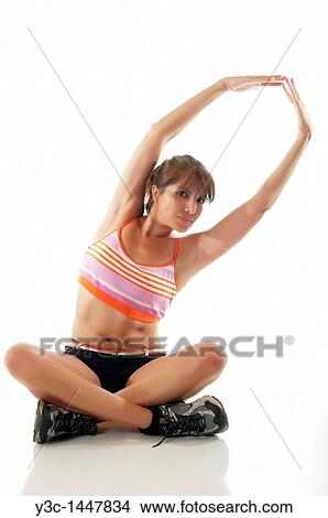 Woman exercising yoga View Large Photo Image Picture - Woman exercising yoga. Fotosearch
