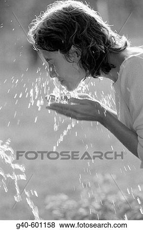Woman, face, hands and water View Large Photo Image Stock Photo - Woman, face, hands and water. Fotosearch