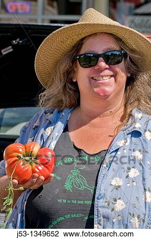 Woman farmer at farmers? market, downtown Arcata, California View Large Photo Image Stock Image - Woman farmer at farmers? market, downtown Arcata, California. Fotosearch