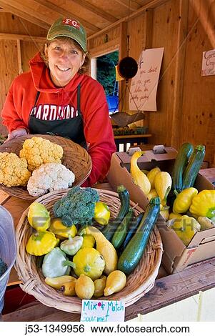 Woman farmer, roadside organic produce stand, Pepperwood, California View Large Photo Image Stock Photograph - Woman farmer, roadside organic produce stand, Pepperwood, California. Fotosearch
