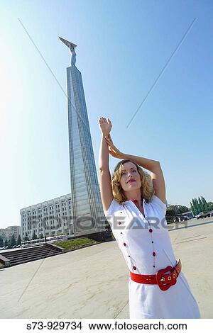 Picture - Woman front the Glory Monument, Samara, Samara Region, Russian Federation, Russia. Fotosearch