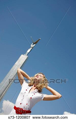 Stock Photo - Woman front the Glory Monument, Samara, Samara Region, Russian Federation, Russia. Fotosearch