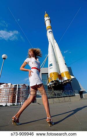 Woman front the Russian space transport rocket. A museum piece. Samara. Russia. View Large Photo Image Stock Photograph - Woman front the Russian space transport rocket. A museum piece. Samara. Russia.. Fotosearch
