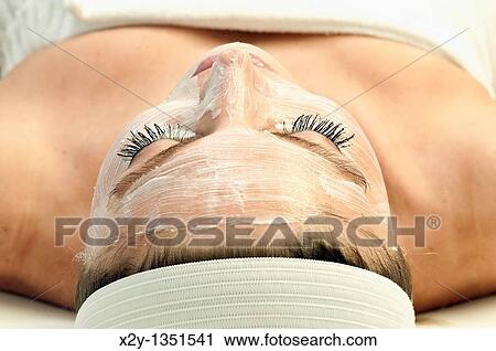 Woman getting a facial treatment at a spa View Large Photo Image Stock Image - Woman getting a facial treatment at a spa. Fotosearch