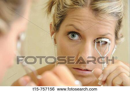 Stock Photograph - woman getting ready. Fotosearch