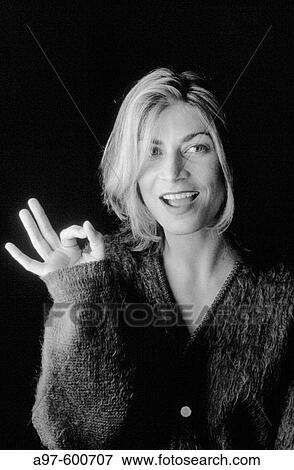 Stock Photo - Woman give okay sign. Fotosearch