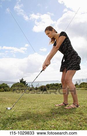 woman golfing View Large Photo Image Stock Image - woman golfing. Fotosearch