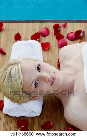 woman having a massage by a pool View Large Photo Image Stock Image - woman having a massage by a pool. Fotosearch