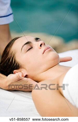 Woman having a massage View Large Photo Image Stock Photo - Woman having a massage. Fotosearch