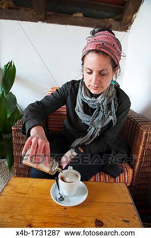 Woman having coffee in cafe Antika cafe restaurant Stari Grad in Hvar island Croatia Europe View Large Photo Image Stock Photo - Woman having coffee in cafe Antika cafe restaurant Stari Grad in Hvar island Croatia Europe. Fotosearch