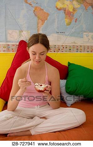 woman holding a bowl of ice cream View Large Photo Image Stock Image - woman holding a bowl of ice cream. Fotosearch