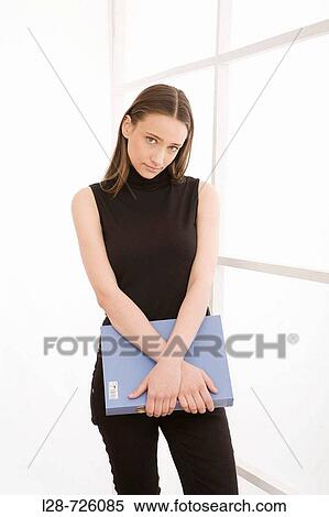 woman holding document View Large Photo Image Stock Photography - woman holding document. Fotosearch