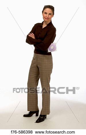 Woman holding DVD View Large Photo Image Stock Photo - Woman holding DVD. Fotosearch
