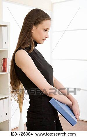 woman holding file folder View Large Photo Image Picture - woman holding file folder. Fotosearch