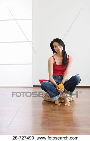 Woman holding glass orange juice View Large Photo Image Stock Image - Woman holding glass orange juice. Fotosearch