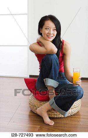 Woman holding glass orange juice View Large Photo Image Stock Image - Woman holding glass orange juice. Fotosearch