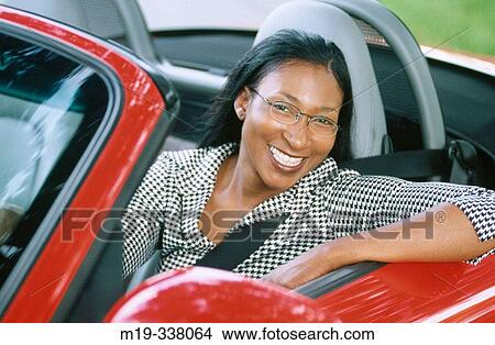 woman in a convertible View Large Photo Image Picture - woman in a convertible. Fotosearch