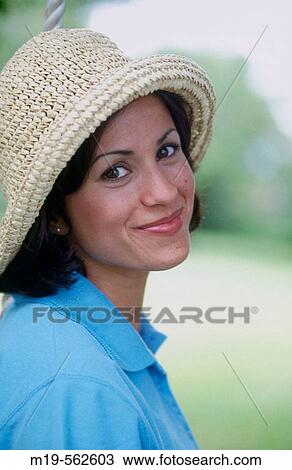 woman in a straw hat View Large Photo Image Stock Image - woman in a straw hat. Fotosearch