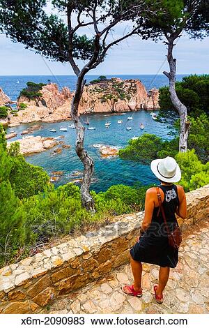 Woman in a viewpoint. Aigua Xelida, Palafrugell. Costa Brava, Gerona. Catalonia, Spain, Europe. View Large Photo Image Stock Image - Woman in a viewpoint. Aigua Xelida, Palafrugell. Costa Brava, Gerona. Catalonia, Spain, Europe.. Fotosearch