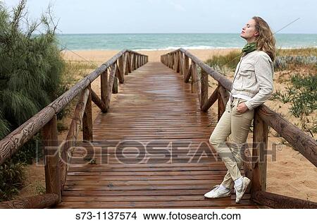 Woman in Barbate beach, Cadiz province, Andalusia, Spain View Large Photo Image Picture - Woman in Barbate beach, Cadiz province, Andalusia, Spain. Fotosearch
