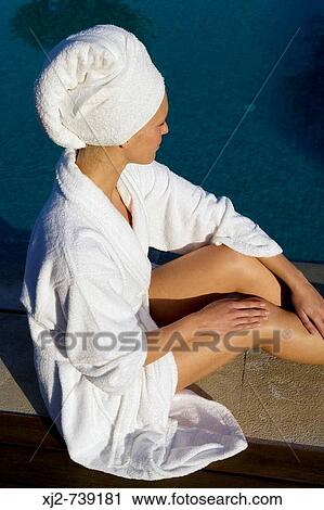 Woman in bathrobe and towel on the head View Large Photo Image Stock Image - Woman in bathrobe and towel on the head. Fotosearch