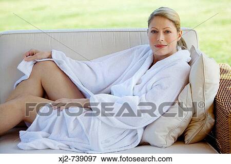 Woman in bathrobe relaxing View Large Photo Image Stock Photo - Woman in bathrobe relaxing. Fotosearch