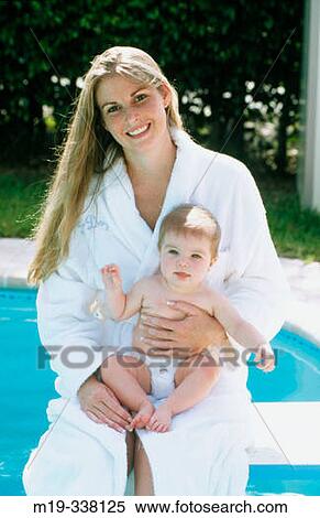 woman in bathrobe with baby View Large Photo Image Stock Photography - woman in bathrobe with baby. Fotosearch