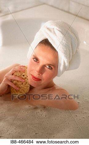 Woman in bathtub View Large Photo Image Picture - Woman in bathtub. Fotosearch