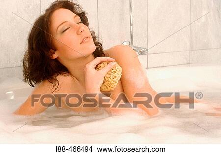 Woman in bathtub View Large Photo Image Picture - Woman in bathtub. Fotosearch