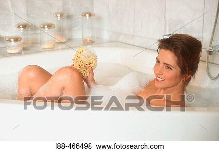 Woman in bathtub View Large Photo Image Stock Photo - Woman in bathtub. Fotosearch